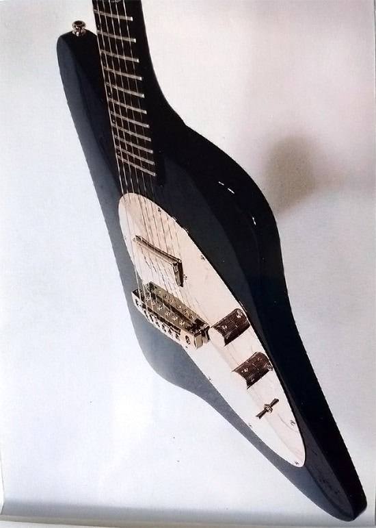 Angled view of Gucci guitar